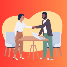 Due persone a colloquio che si stringono la mano